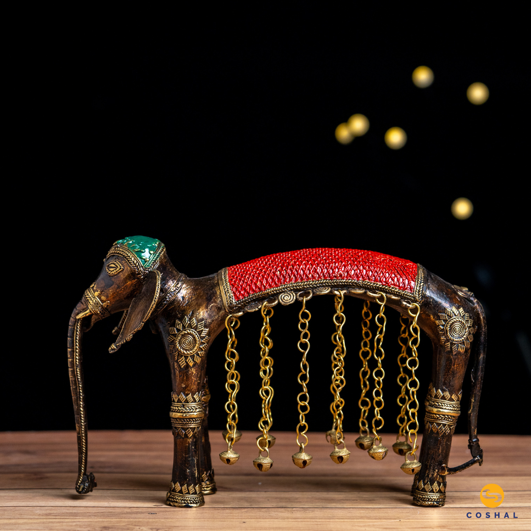 This exquisite Brass Elephant is a testament to the timeless Dhokra art, meticulously crafted by tribal artisans.