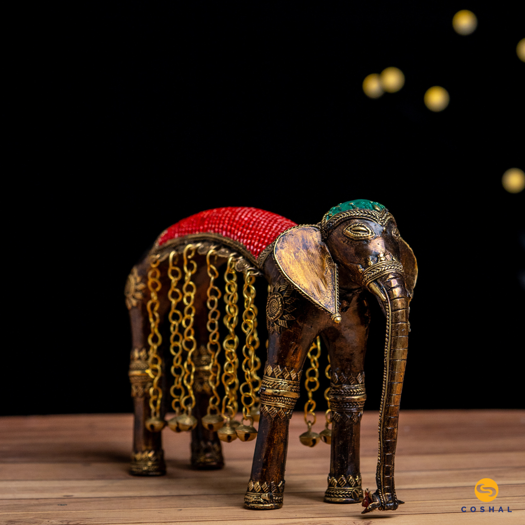 The elephant, a symbol of strength and wisdom, adorned with bells, adds a touch of tradition and charm.